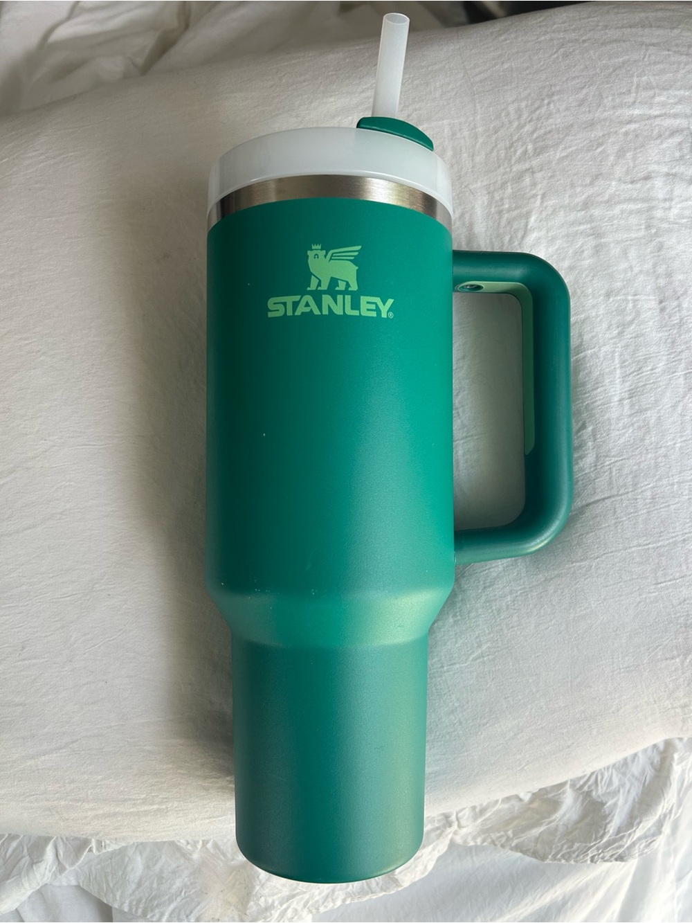Stanley 40oz Green Insulated Travel Mug with Handle and Straw.